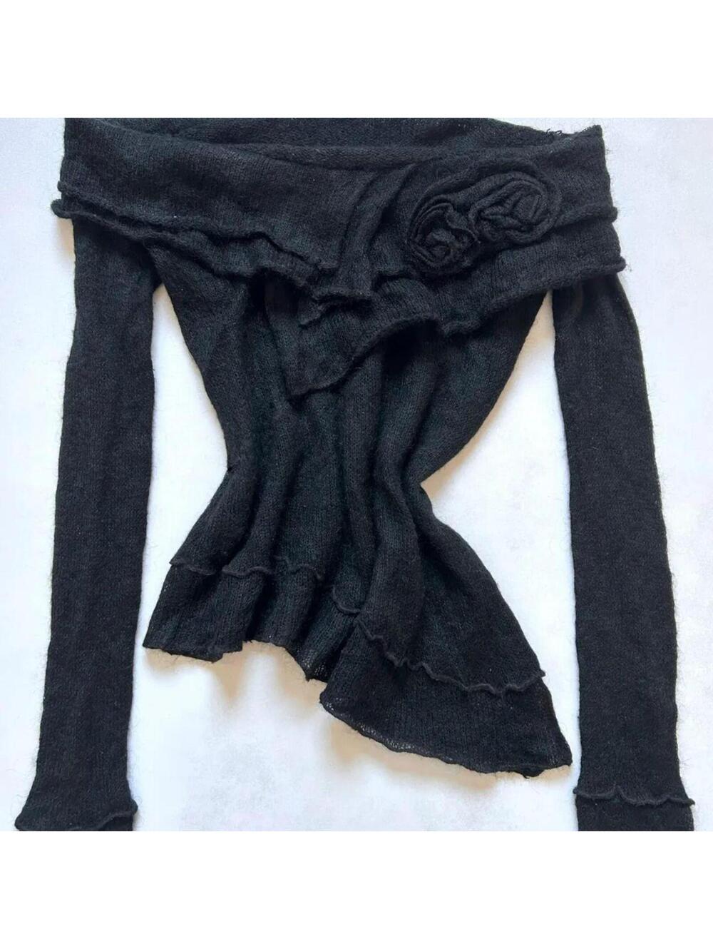 black off-the-shoulder ruffled knit sweater